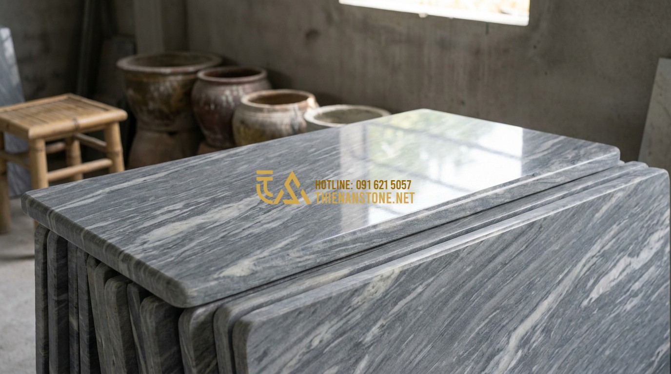 Tạo ảnh tiếng Anh: Close-up of different types of polished granite slabs showing various colors like black, red, and salt-and-pepper. The crystalline texture is visible, reflecting the studio light, professional product catalog style.