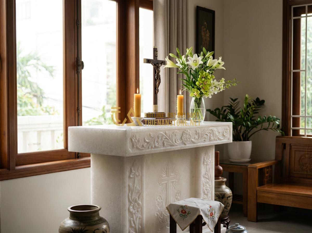 Tạo ảnh tiếng Anh: Professional high-resolution image of an elegant Catholic stone altar made of natural granite in a serene Vietnamese family home, featuring a crucifix, lit candles, fresh flowers, soft natural lighting from window, warm spiritual atmosphere, detailed carving on stone surface, realistic and emotional style