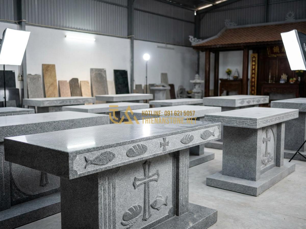 Tạo ảnh tiếng Anh: High-quality realistic image of various styles of Catholic stone altars displayed in a professional stone workshop showroom, different sizes and designs, polished granite and marble, religious symbols carved, bright studio lighting, professional photography style