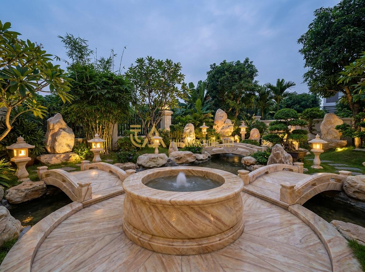 Tạo ảnh tiếng Anh: Beautiful wide-angle view of a completed luxurious Vietnamese garden with a central natural stone well featuring gentle water flow, surrounded by complementary stone bridge elements, decorative garden stones and elegant stone lanterns at twilight with soft lighting, professional realistic photography showing harmonious landscape design