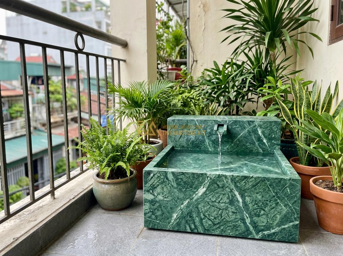 Ang Nước Phong Thủy Hợp Mệnh Gia Chủ: Bí Quyết Chọn Đá Tăng Vượng Khí - Hình 17 Ang Nước Phong Thủy Hợp Mệnh Gia Chủ: Bí Quyết Chọn Đá Tăng Vượng Khí - Compact stone water feature for small balcony or patio, with minimal water flow