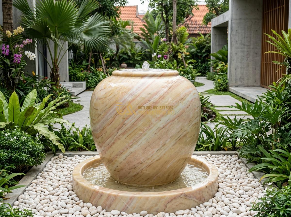 Ang Nước Phong Thủy Hợp Mệnh Gia Chủ: Bí Quyết Chọn Đá Tăng Vượng Khí - Hình 5 Ang Nước Phong Thủy Hợp Mệnh Gia Chủ: Bí Quyết Chọn Đá Tăng Vượng Khí - Polished white granite water urn designed for Metal element feng shui, placed in