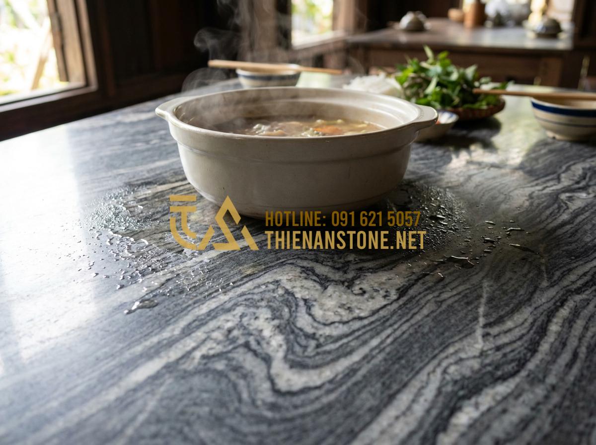 Bàn Ăn Bằng Đá Granite (Hoa Cương): Sự Lựa Chọn Vĩnh Cửu Cho Bếp Việt - Hình 2 Bàn Ăn Bằng Đá Granite (Hoa Cương): Sự Lựa Chọn Vĩnh Cửu Cho Bếp Việt - Tạo ảnh tiếng Anh: Detailed close-up of a granite dining table surface with a st