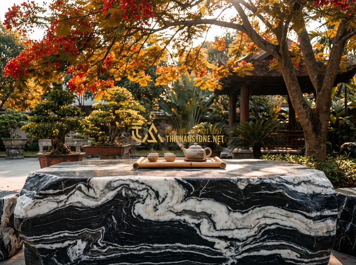 Báo Giá Bộ Bàn Ghế Đá Tự Nhiên Nguyên Khối Mới Nhất 2024 - Giá Rẻ Tại Hà Nội - Professional photography of a luxury garden setting in Hanoi during autumn, feat