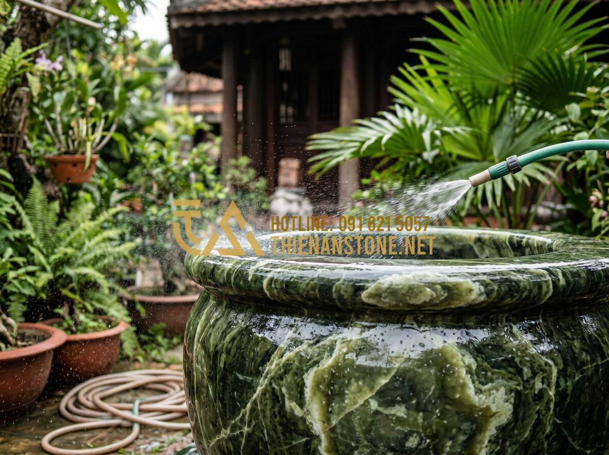 Bí quyết vệ sinh giếng đá tự nhiên sạch bong rêu mốc chỉ trong 15 phút - Tạo ảnh tiếng Anh: A person using a garden hose to gently spray water onto a dec