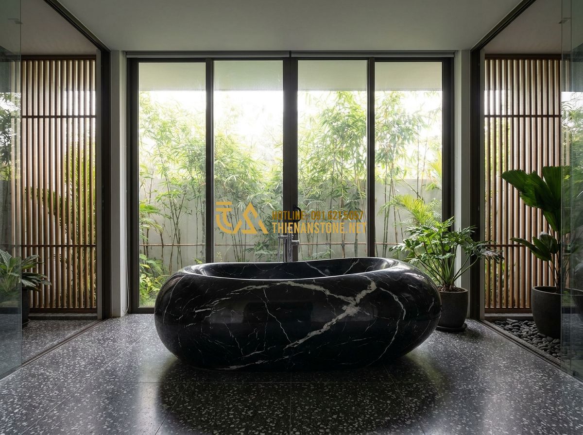 Bồn Tắm Đá Mài Terrazzo & Solid Surface: Đặc Điểm, Ưu Điểm & Mẫu Đẹp Nhất 2026 - A wide shot of a master bathroom with a bồn tắm nằm đá nhân tạo shaped like a sm
