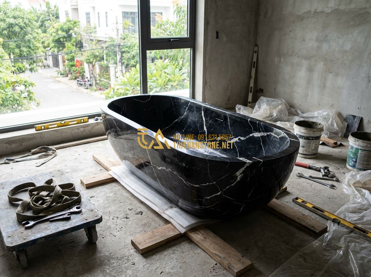 Bồn Tắm Đá Tự Nhiên Đẹp 2026: 120+ Mẫu Bồn Tắm Đá Nguyên Khối Cẩm Thạch Hoa Cương Sang Trọng - Hình 1 Bồn Tắm Đá Tự Nhiên Đẹp 2026: 120+ Mẫu Bồn Tắm Đá Nguyên Khối Cẩm Thạch Hoa Cương Sang Trọng - Create image in English: Rustic pebble stone natural bathtub made of river stone