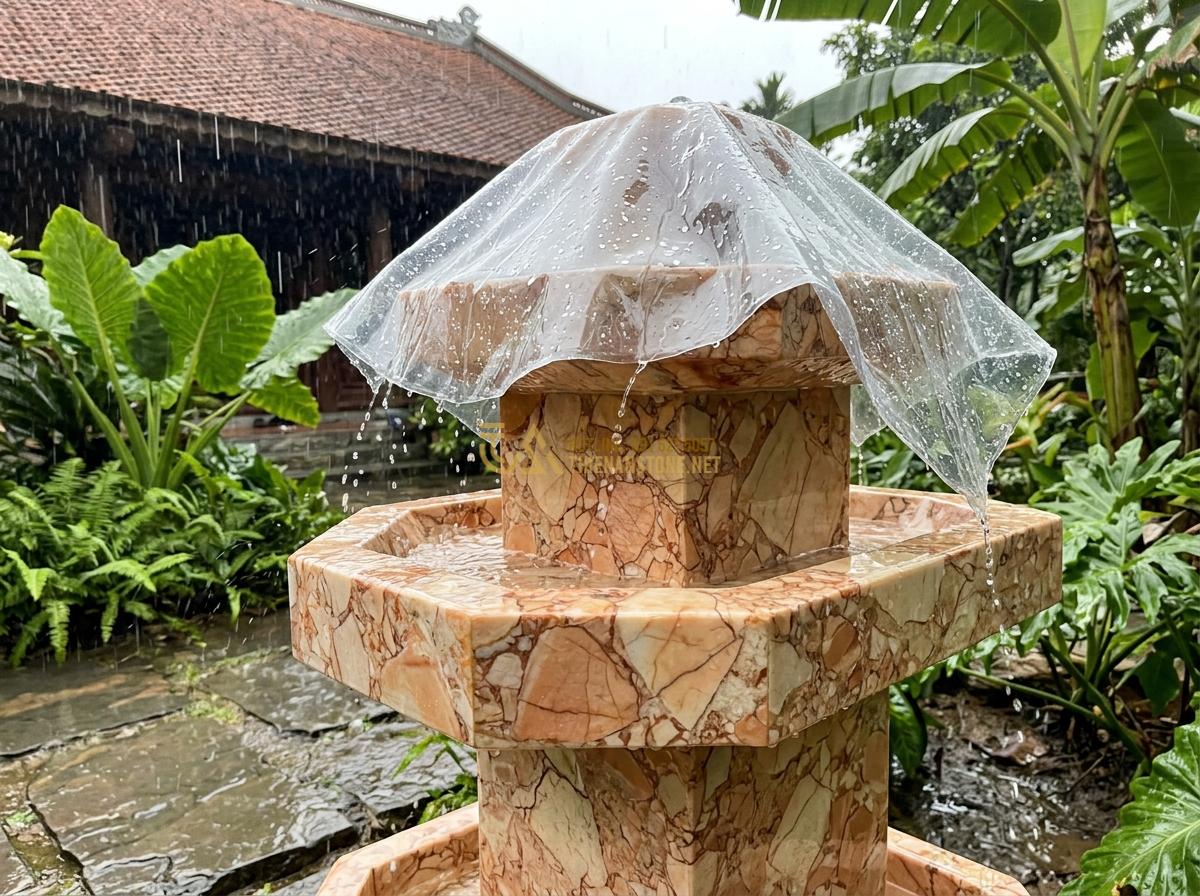 Cách Bảo Dưỡng Đài Phun Nước Bằng Đá Tự Nhiên Để Luôn Bền Đẹp Theo Thời Gian - Weather protection measures on outdoor natural stone water fountain during rain