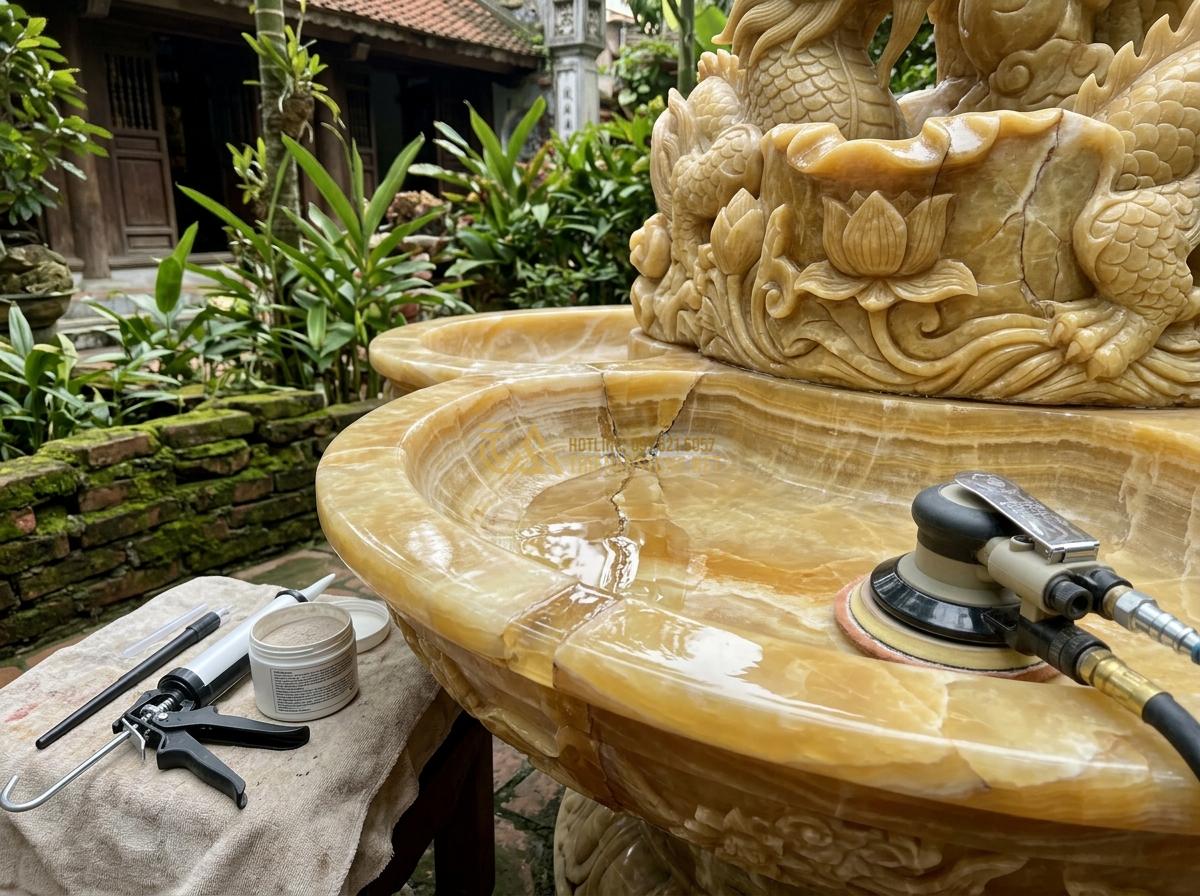 Cách Bảo Dưỡng Đài Phun Nước Bằng Đá Tự Nhiên Để Luôn Bền Đẹp Theo Thời Gian - Professional repair work on cracked natural stone water fountain with epoxy appl