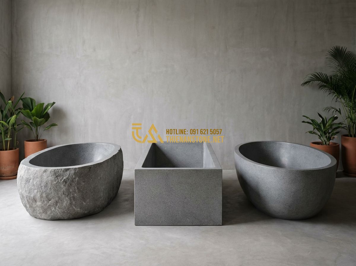Cách Chọn Bồn Tắm Đá Tự Nhiên Đẹp, Bền & Phù Hợp Phong Thủy - Hình 1 Cách Chọn Bồn Tắm Đá Tự Nhiên Đẹp, Bền & Phù Hợp Phong Thủy - Tạo ảnh tiếng Anh: Showcase of three different stone bathtubs side by side: a da