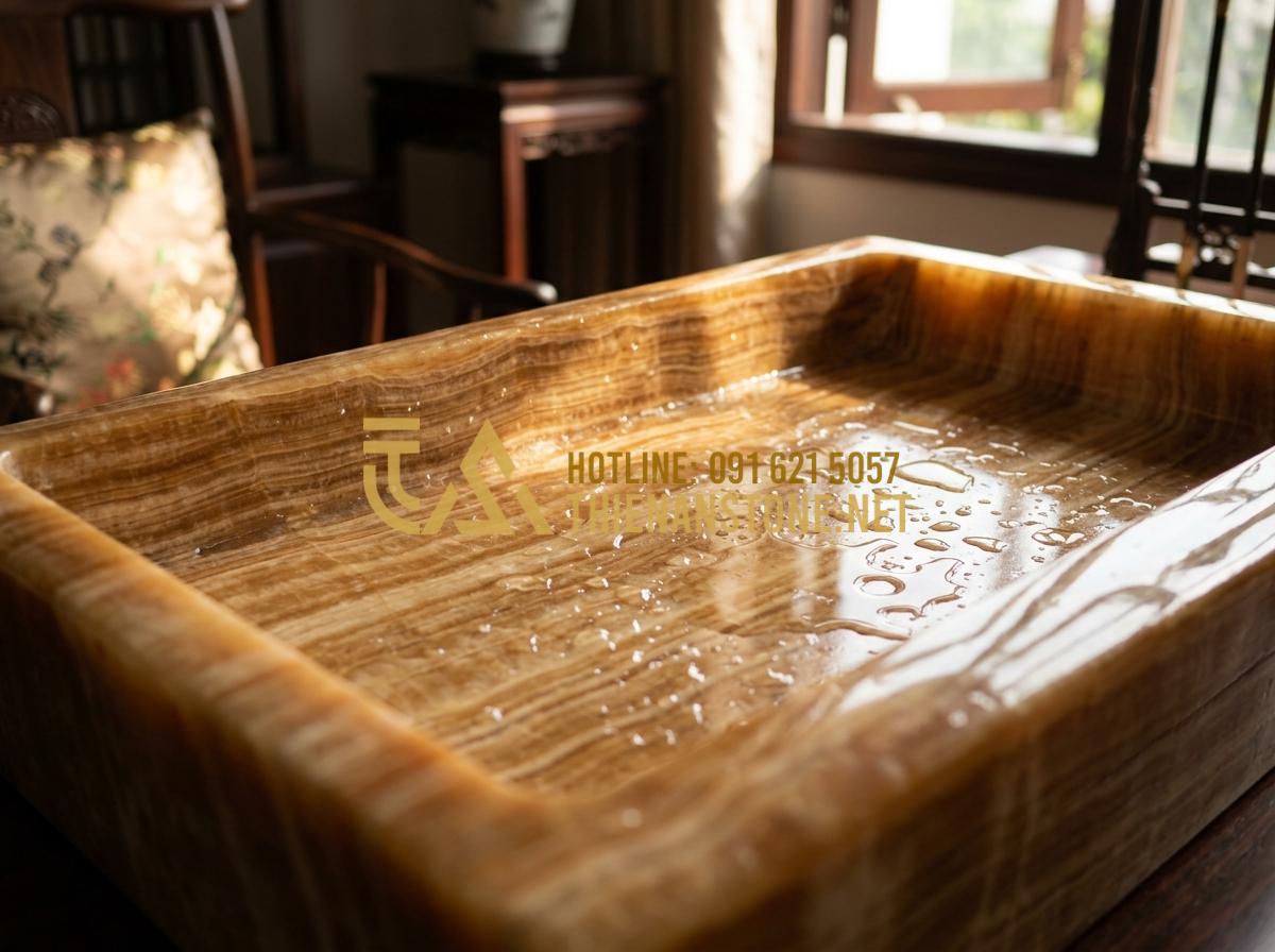 Cách vệ sinh gạt tàn đá tự nhiên luôn sáng bóng, không ám mùi thuốc - Tạo ảnh tiếng Anh: A person gently cleaning a green jade stone ashtray with a so