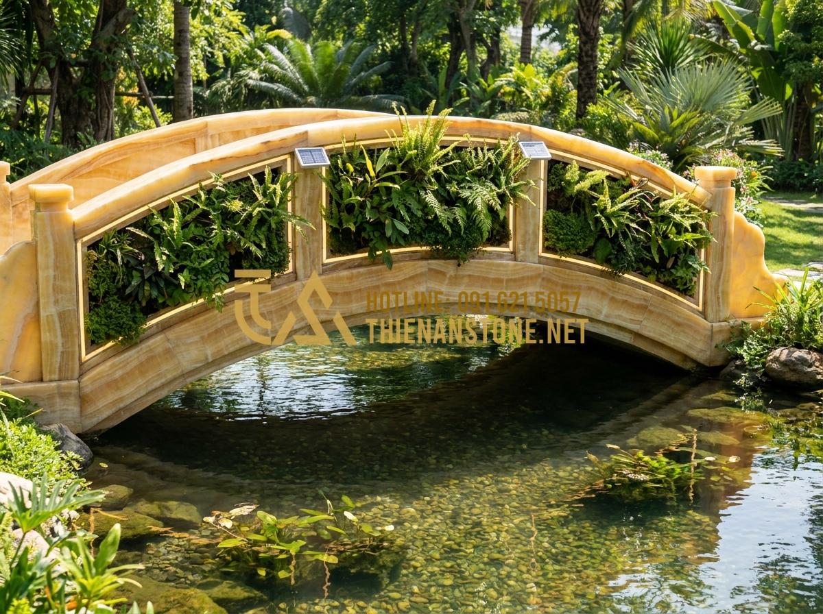 Cầu đá sân vườn: 55+ Mẫu cầu trang trí sân vườn đẹp và đẳng cấp 2026 - Hình 8 Cầu đá sân vườn: 55+ Mẫu cầu trang trí sân vườn đẹp và đẳng cấp 2026 - Tạo ảnh tiếng Anh: A modern stone bridge design integrating solar-powered lights