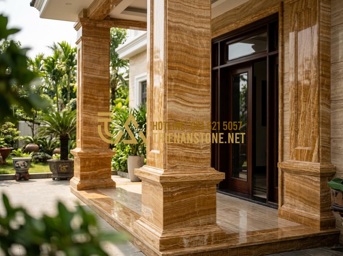 Chân tảng đá kê cột nhà: 101+ Mẫu đẹp và kinh nghiệm lựa chọn từ chuyên gia - Hình 10 Chân tảng đá kê cột nhà: 101+ Mẫu đẹp và kinh nghiệm lựa chọn từ chuyên gia - A luxurious modern villa entrance featuring massive white marble columns with ma
