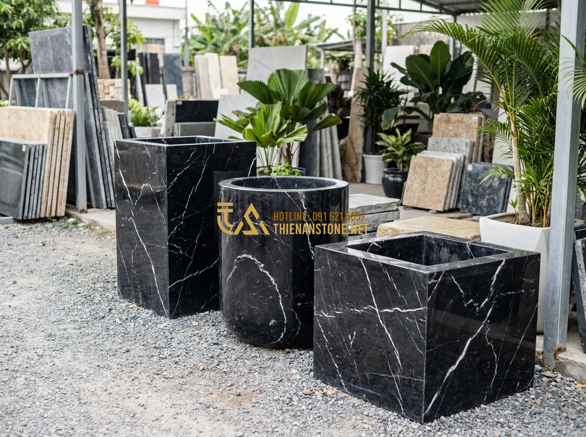Chậu Đá Tự Nhiên Trồng Cây Cảnh Cao Cấp: Đặc Điểm, Ưu Điểm & Ứng Dụng Trang Trí Không Gian Xanh - A row of diverse natural stone planters made of granite, marble, and river stone