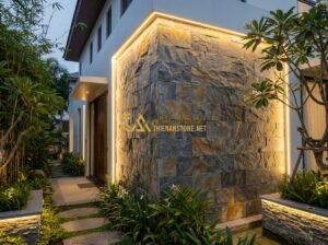 Đá Ghép Ốp Tường Có Nên Làm Không? Lưu Ý Quan Trọng Khi Thi Công - Tạo ảnh tiếng Anh: A high-end luxury villa facade featuring a large accent wall