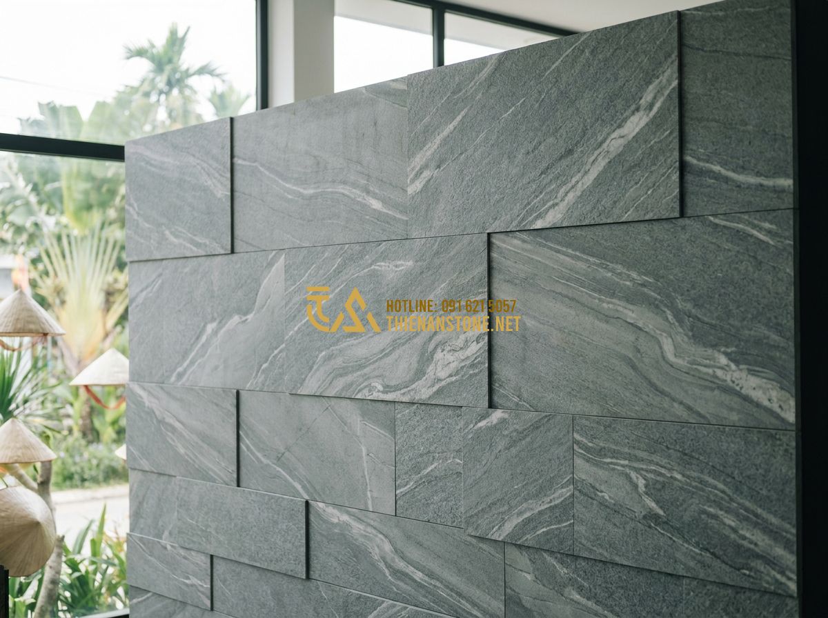 Đá Ốp Tường Giá Rẻ Mà Vẫn Đẹp – Bí Quyết Chọn & Mua Đá Ốp Tường Tiết Kiệm 2026 - Tạo ảnh tiếng Anh: A display of natural slate wall tiles in various shades of gr