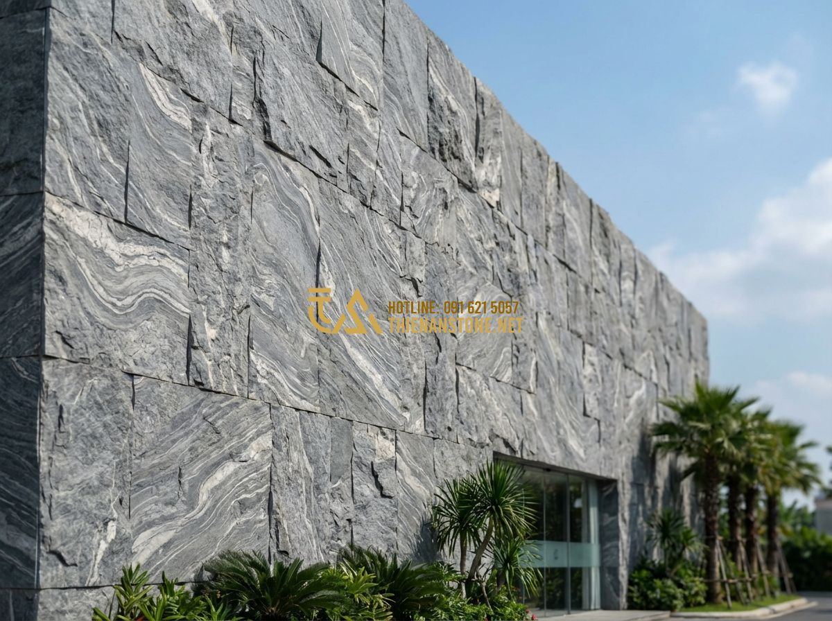 Đá Rối Ốp Tường Đẹp 2026: 120+ Mẫu Tường Đá Rối Tự Nhiên Sang Trọng & Hiện Đại Nhất - Tạo ảnh tiếng Anh: A majestic exterior wall of a high-end office building clad i