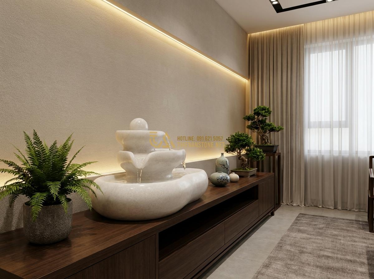 Đài Phun Nước Bằng Đá Phong Thủy: Ý Nghĩa, Cách Bố Trí & Lợi Ích Mang Lại Tài Lộc - Elegant indoor tabletop stone water fountain with subtle water flow placed on a