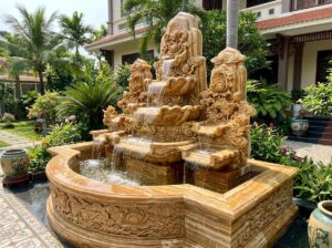 Đài Phun Nước Đá Mỹ Nghệ Cao Cấp: Sự Khác Biệt Giữa Đá Tự Nhiên Và Các Loại Khác - A luxurious high-end artistic stone water fountain made from natural granite wit