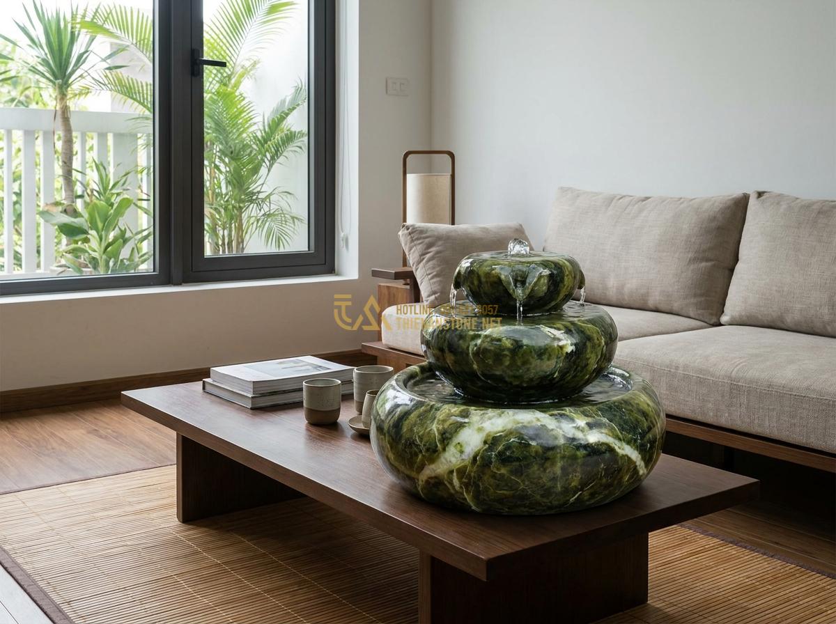 Đài Phun Nước Mini Bằng Đá Tự Nhiên: Mẫu Đẹp, Giá Rẻ Cho Không Gian Nhỏ & Để Bàn - Hình 19 Đài Phun Nước Mini Bằng Đá Tự Nhiên: Mẫu Đẹp, Giá Rẻ Cho Không Gian Nhỏ & Để Bàn - Real-life application of mini stone fountain in modern home interior on coffee t