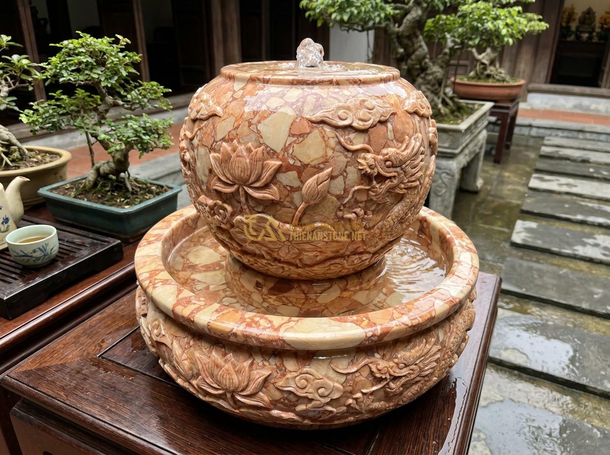 Đài Phun Nước Mini Bằng Đá Tự Nhiên: Mẫu Đẹp, Giá Rẻ Cho Không Gian Nhỏ & Để Bàn - Hình 6 Đài Phun Nước Mini Bằng Đá Tự Nhiên: Mẫu Đẹp, Giá Rẻ Cho Không Gian Nhỏ & Để Bàn - Polished marble mini fountain with intricate carvings and flowing water, luxury