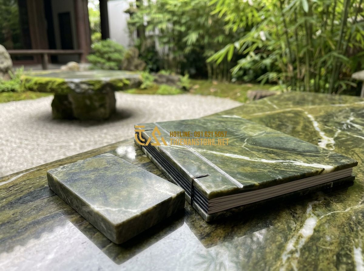 Địa Chỉ Mua Bàn Ghế Đá Tự Nhiên Nguyên Khối Uy Tín Tại Hà Nội & Các Tỉnh - Create a professional image: A stylish business card and a high-end catalog of s