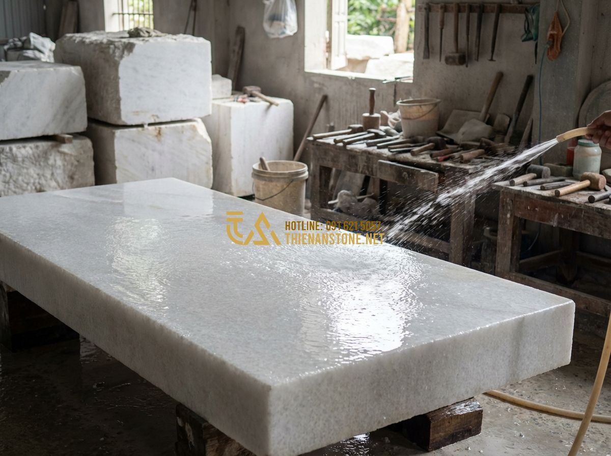 Địa Chỉ Mua Bàn Ghế Đá Tự Nhiên Nguyên Khối Uy Tín Tại Hà Nội & Các Tỉnh - Create a high-quality image: Skilled artisans in a traditional stone workshop me