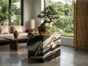 Đôn Đá Vuông Tự Nhiên Cao Cấp: Mẫu Đẹp Nhất Dùng Kê Cây Cảnh & Trang Trí Nội Thất 2026 - Tạo ảnh tiếng Anh: A high-end square natural stone pedestal placed in a minimali