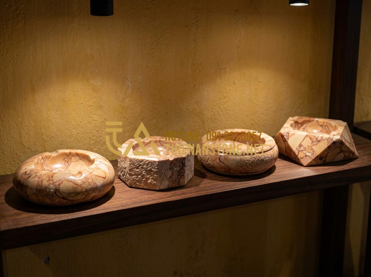 Gạt tàn độc đáo bằng đá tự nhiên: Món quà tặng sếp tinh tế và sang trọng - A collection of various stone ashtrays displayed on a minimalist shelf, showing