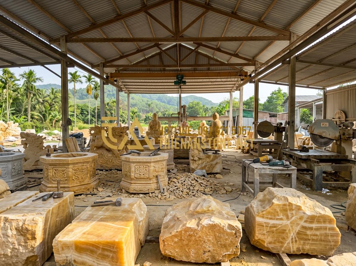 Giếng đá sân vườn: Tinh hoa kiến trúc cảnh quan và xu hướng trang trí 2026 - Tạo ảnh tiếng Anh: A wide shot of the Thien An Stone workshop (Xưởng Đá Mỹ Nghệ