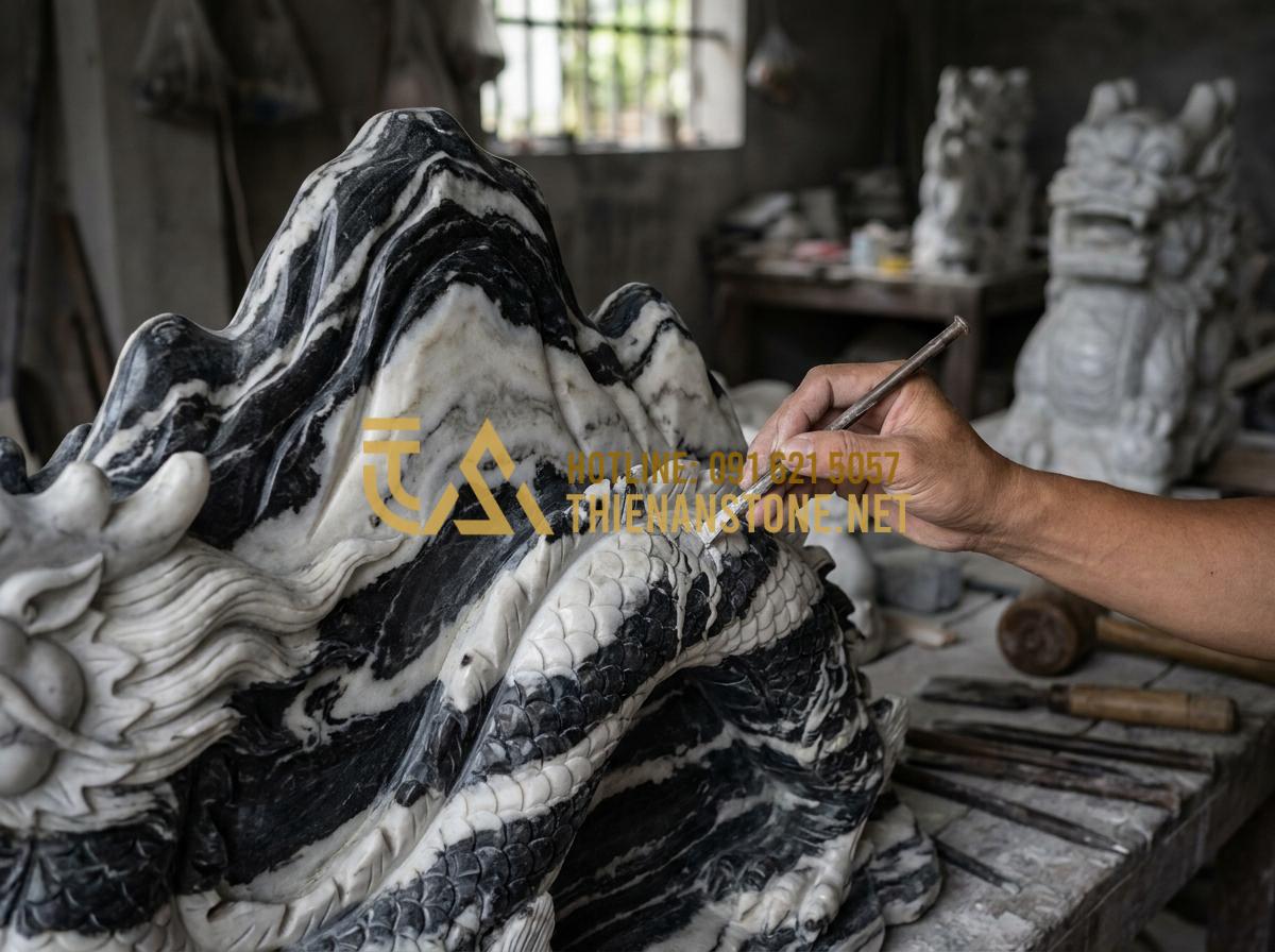 Hỏi Đáp: Vỡ Chiếu Rồng Đá Có Sao Không? Cách Hóa Giải Theo Phong Thủy - Tạo ảnh tiếng Anh: A skilled craftsman in a workshop repairing a stone dragon sc