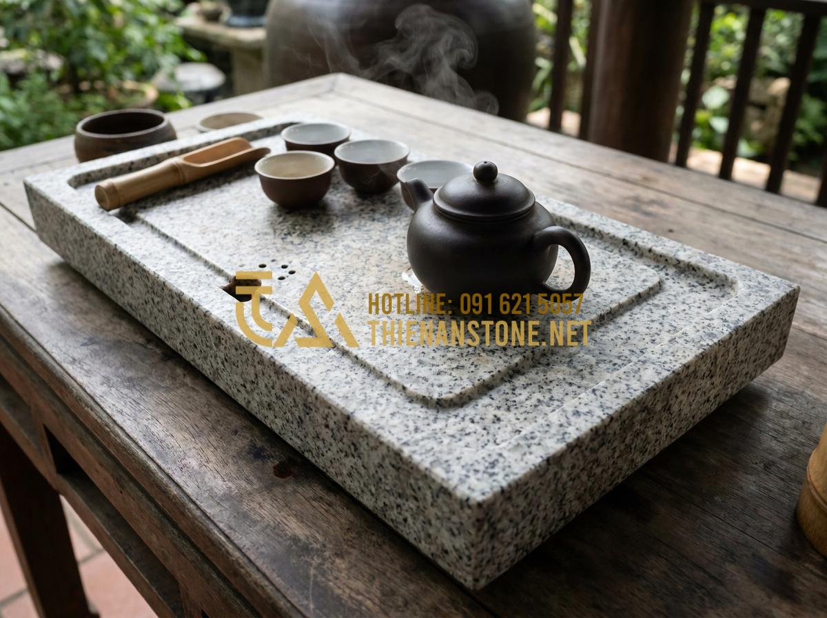 Hướng Dẫn Cách Lắp Đặt Và Xử Lý Khay Trà Đá Thoát Nước Luôn Khô Thoáng - Elegant natural stone tea tray with drainage system in use during a traditional