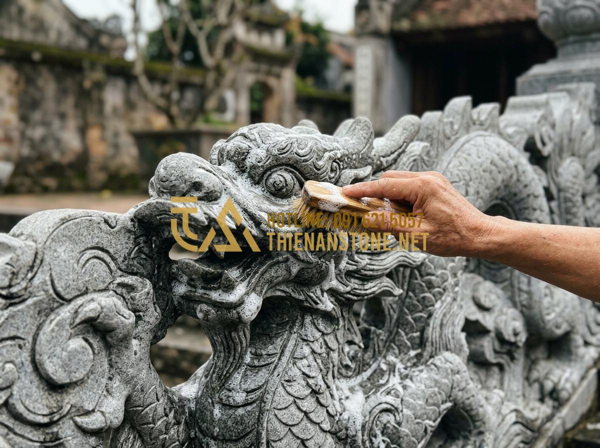 Hướng dẫn vệ sinh và bảo dưỡng phù điêu đá ngoài trời luôn như mới - Tạo ảnh tiếng Anh: Close-up of hands using a soft-bristled brush to gently clean