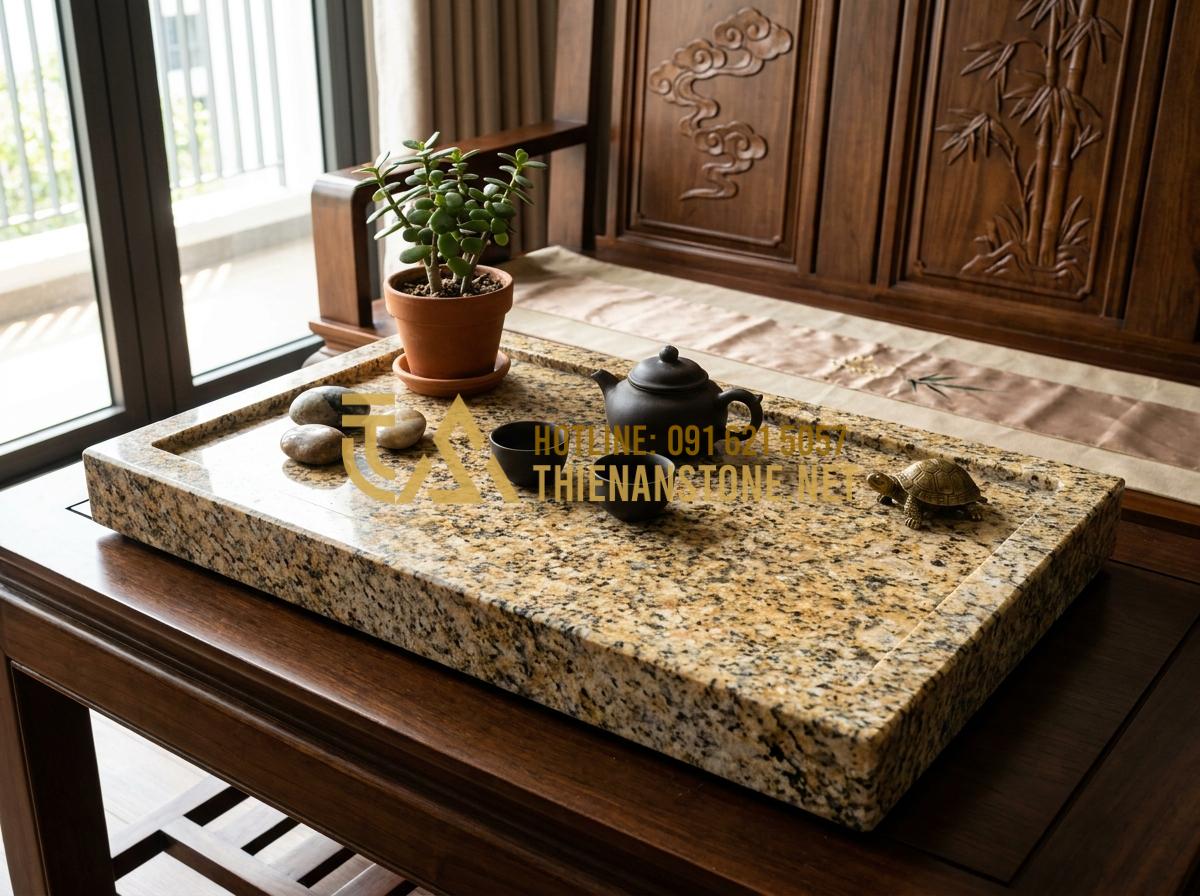 Khay Trà Đá Hoa Cương (Granite): Sự Lựa Chọn Vĩnh Cửu Cho Mọi Không Gian - Hình 11 Khay Trà Đá Hoa Cương (Granite): Sự Lựa Chọn Vĩnh Cửu Cho Mọi Không Gian - Feng shui arrangement of a granite tea tray in a living room with auspicious sym