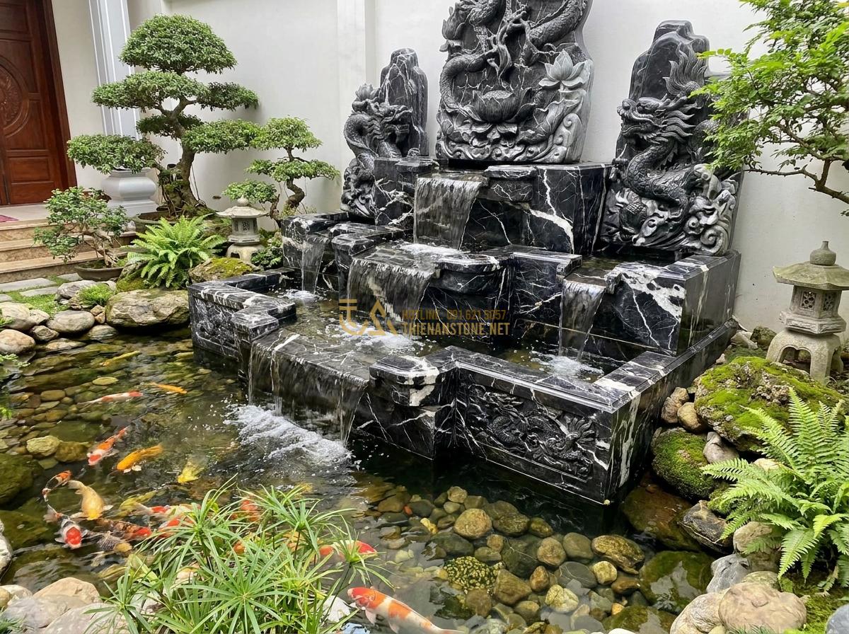 Lợi Ích Tuyệt Vời Khi Sử Dụng Đài Phun Nước Bằng Đá Trong Thiết Kế Tiểu Cảnh & Hồ Cá Koi - Multi-tiered carved stone fountain design with cascading water levels in a detai