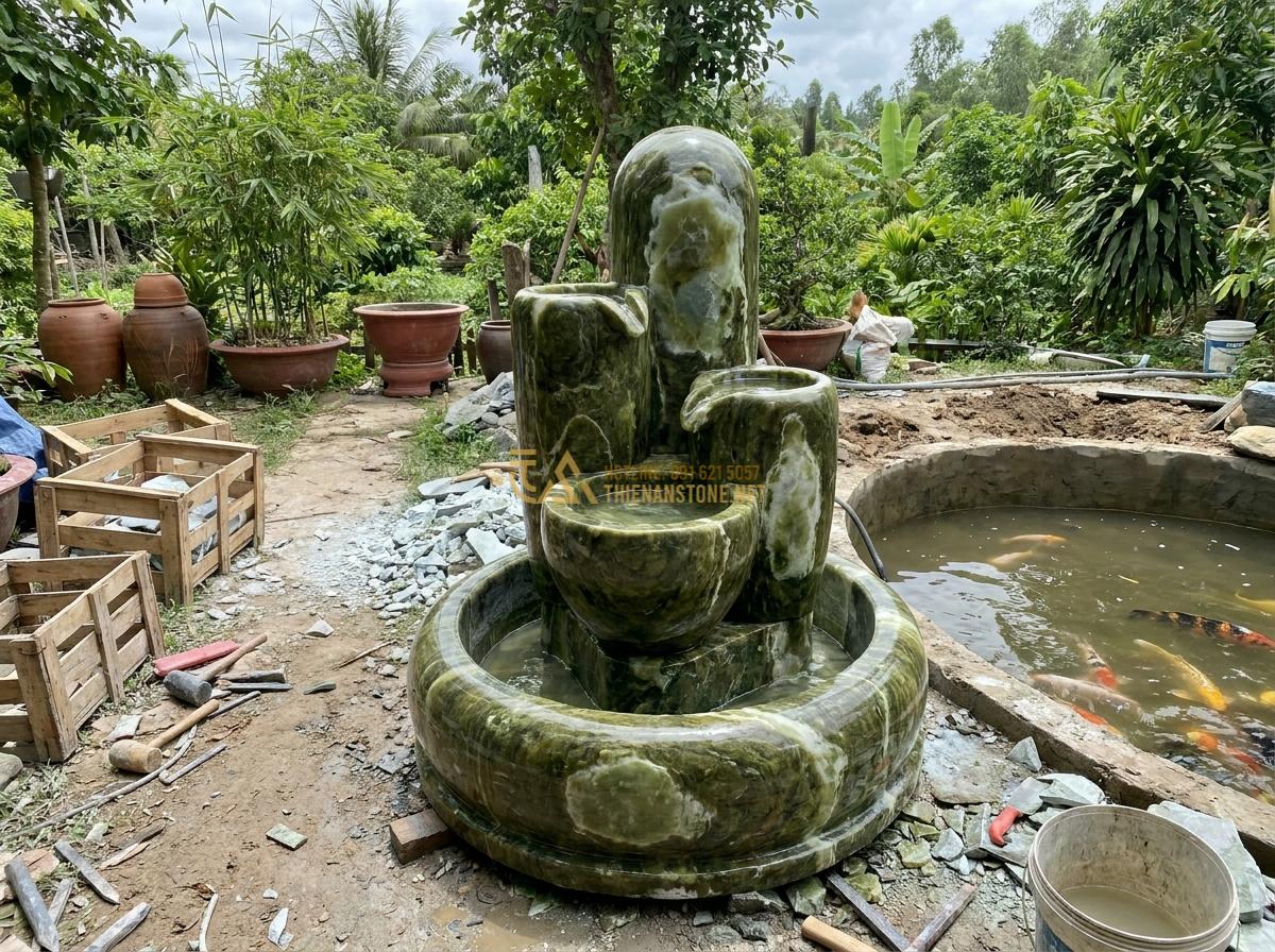 Lợi Ích Tuyệt Vời Khi Sử Dụng Đài Phun Nước Bằng Đá Trong Thiết Kế Tiểu Cảnh & Hồ Cá Koi - Team of skilled artisans at work carving and installing a custom stone water fou