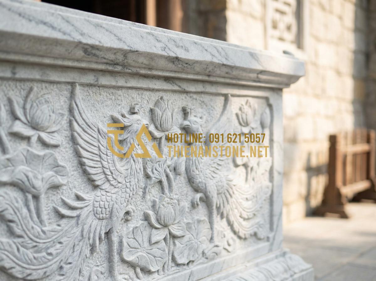 Mua Bàn Thờ Ông Địa Bằng Đá TPHCM: Top 5 Địa Chỉ Uy Tín Và Chất Lượng Nhất - Close-up detail of a hand-carved stone altar showing intricate patterns of lotus