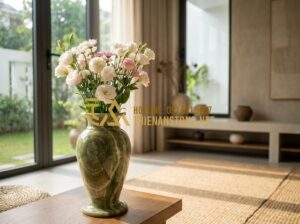 Nên Chọn Lọ Hoa Bằng Đá Hay Lọ Hoa Gốm Sứ? So Sánh Độ Bền Và Tính Thẩm Mỹ - Luxurious natural stone flower vase with intricate natural veins placed in a mod