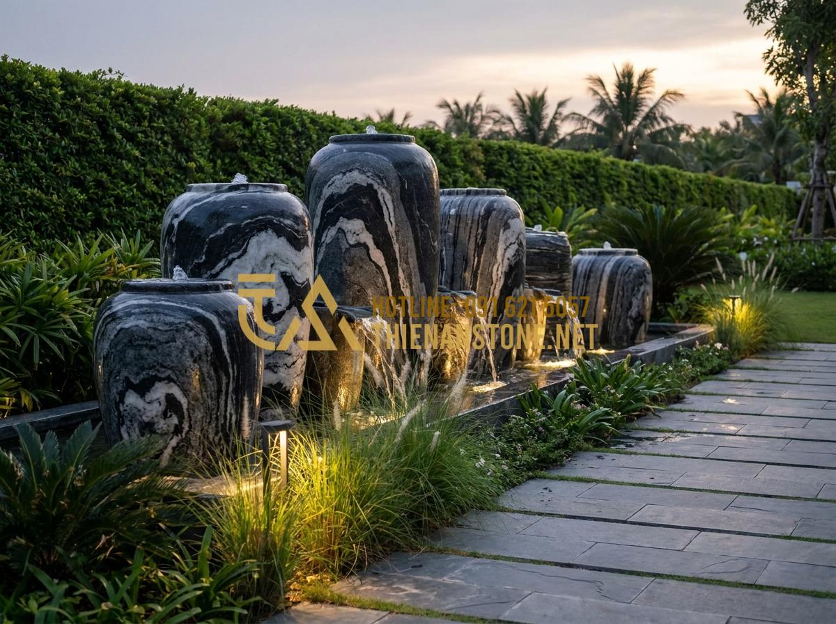 Nghệ thuật trang trí lu nước: Từ vẻ đẹp 'lu đựng nước xưa' đến phong cách hiện đại - Hình 3 Nghệ thuật trang trí lu nước: Từ vẻ đẹp 'lu đựng nước xưa' đến phong cách hiện đại - Tạo ảnh tiếng Anh: A modern luxury garden design featuring a series of stone wat