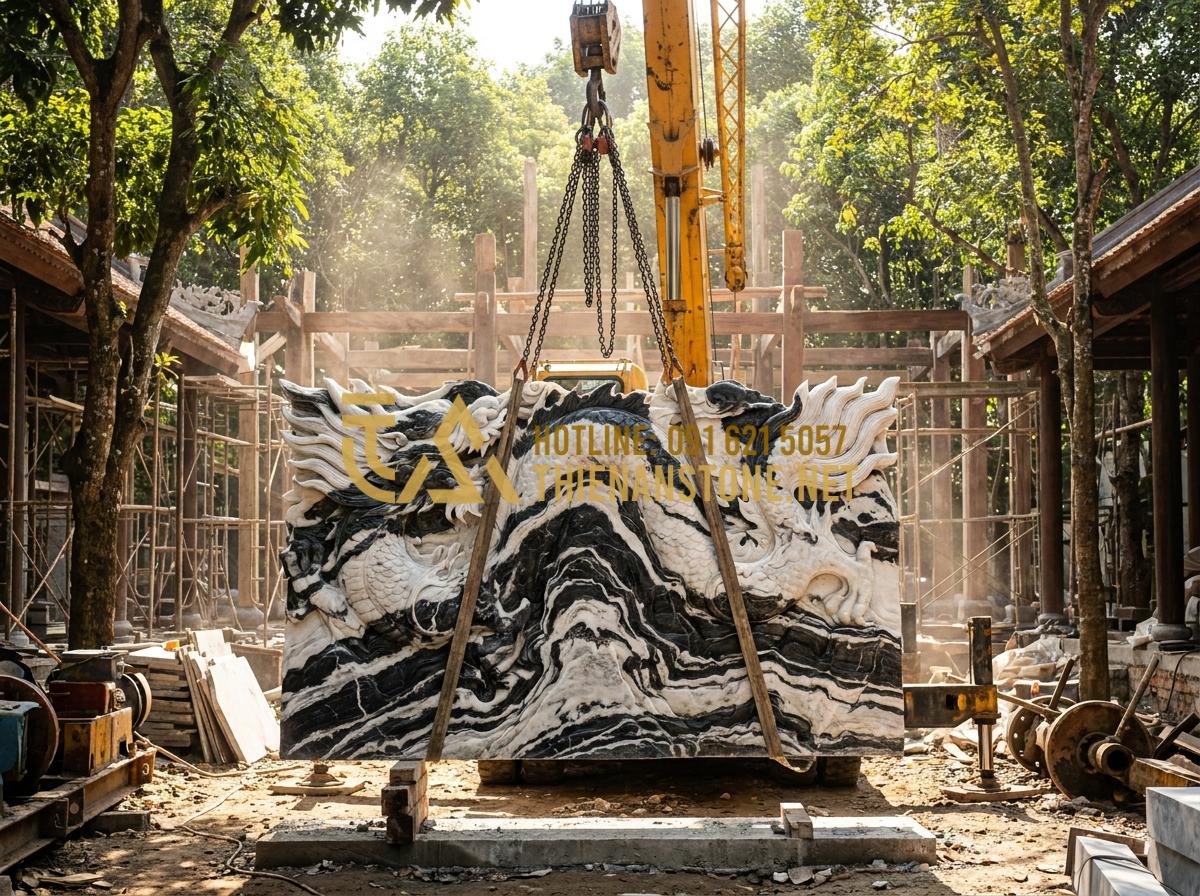 Quy Trình Chế Tác Chiếu Rồng Đá Mỹ Nghệ Công Phu Tại Làng Nghề Ninh Vân - Tạo ảnh tiếng Anh: A large stone dragon screen being carefully lifted by a speci