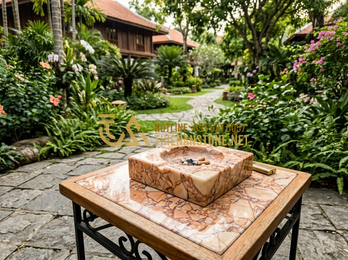 Thùng rác gạt tàn đá hoa cương: Giải pháp sang trọng cho sảnh khách sạn, tòa nhà - Hình 5 Thùng rác gạt tàn đá hoa cương: Giải pháp sang trọng cho sảnh khách sạn, tòa nhà - Tạo ảnh tiếng Anh: An outdoor smoking area of a luxury resort featuring a sturdy