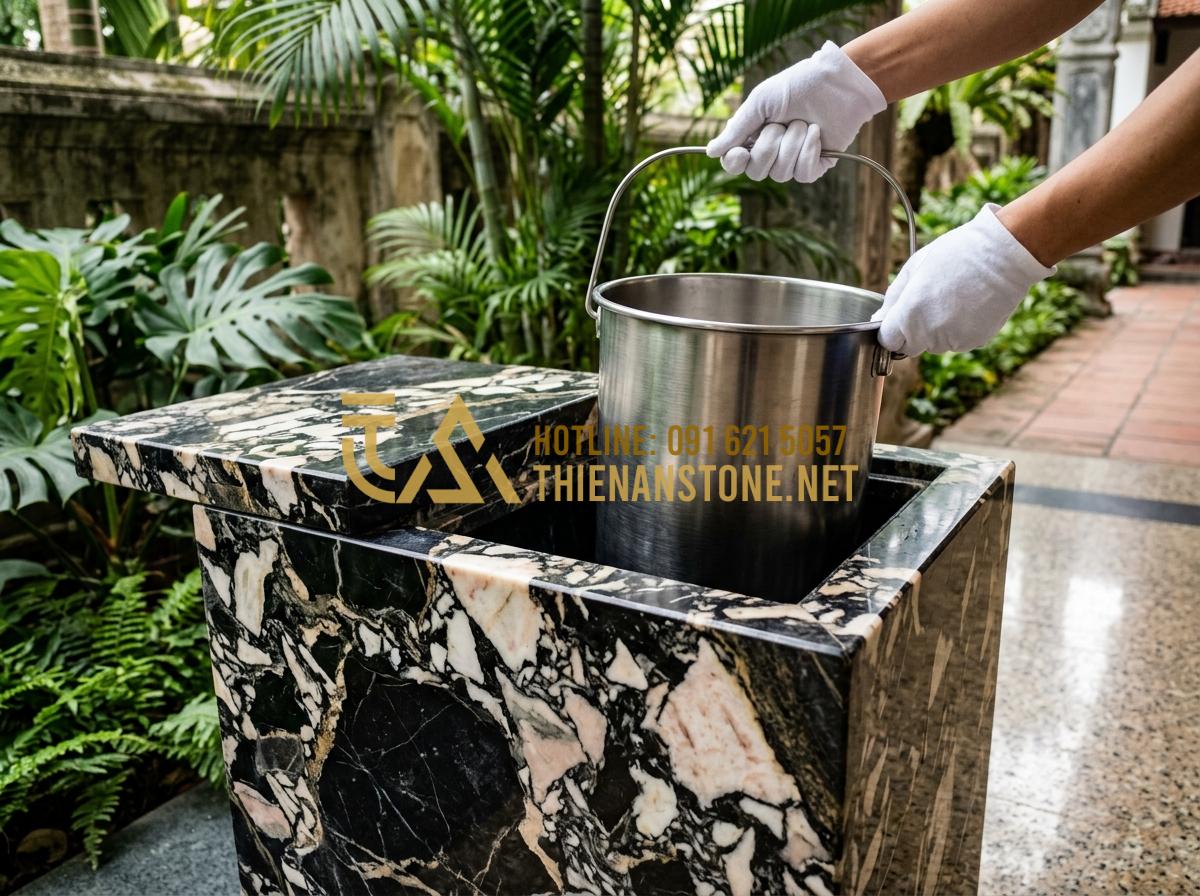 Thùng rác gạt tàn đá hoa cương: Giải pháp sang trọng cho sảnh khách sạn, tòa nhà - Hình 6 Thùng rác gạt tàn đá hoa cương: Giải pháp sang trọng cho sảnh khách sạn, tòa nhà - Tạo ảnh tiếng Anh: Detailed view of the internal components of a granite trash c