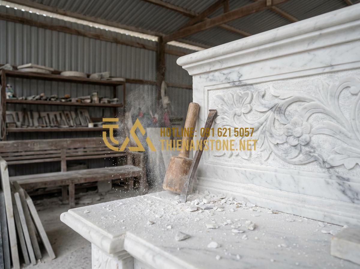 Top 50+ Mẫu Lò Sưởi Đá Tự Nhiên Đẹp, Đẳng Cấp Cho Biệt Thự 2026 - Tạo ảnh tiếng Anh: A skilled artisan in a stone carving workshop, meticulously c