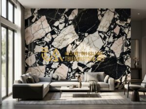 Tranh đá tự nhiên: Nghệ thuật trang trí đẳng cấp và xu hướng kiến trúc 2026 - Professional photography of a luxury modern living room with a large-scale natur