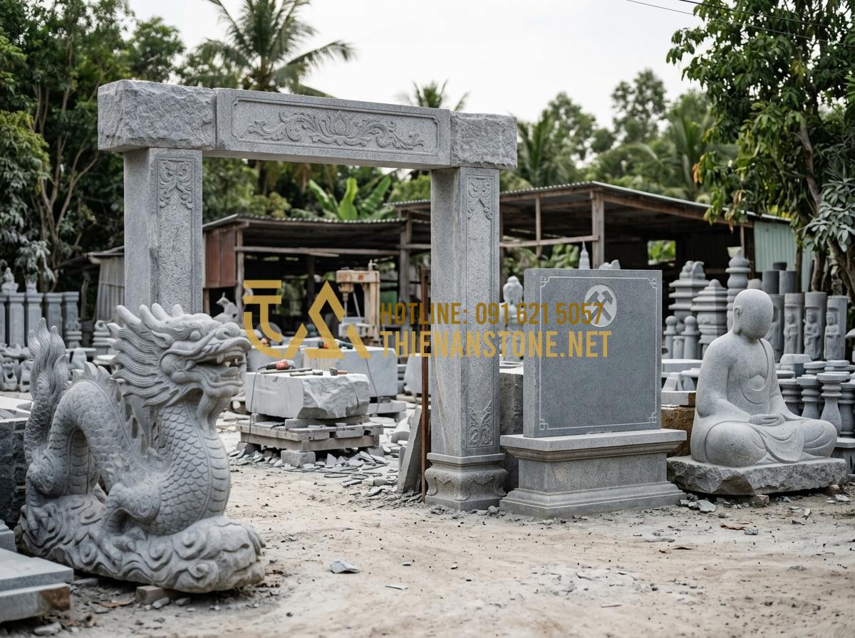 Xu hướng sử dụng đá cuội tự nhiên làm nắp hút đáy cho hồ cá sân vườn 2026 - Tạo ảnh tiếng Anh: The entrance of 'Thien An Stone' craft village, featuring lar