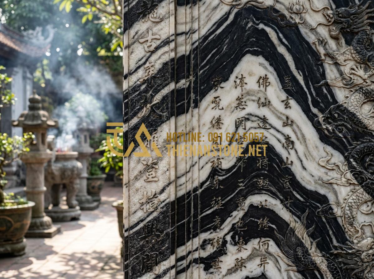Ý Nghĩa Cuốn Thư Đá Bình Phong Trong Văn Hóa Tâm Linh Và Cách Đặt Chuẩn - Hình 1 Ý Nghĩa Cuốn Thư Đá Bình Phong Trong Văn Hóa Tâm Linh Và Cách Đặt Chuẩn - Detailed close-up view of a traditional Vietnamese stone scroll screen called cu