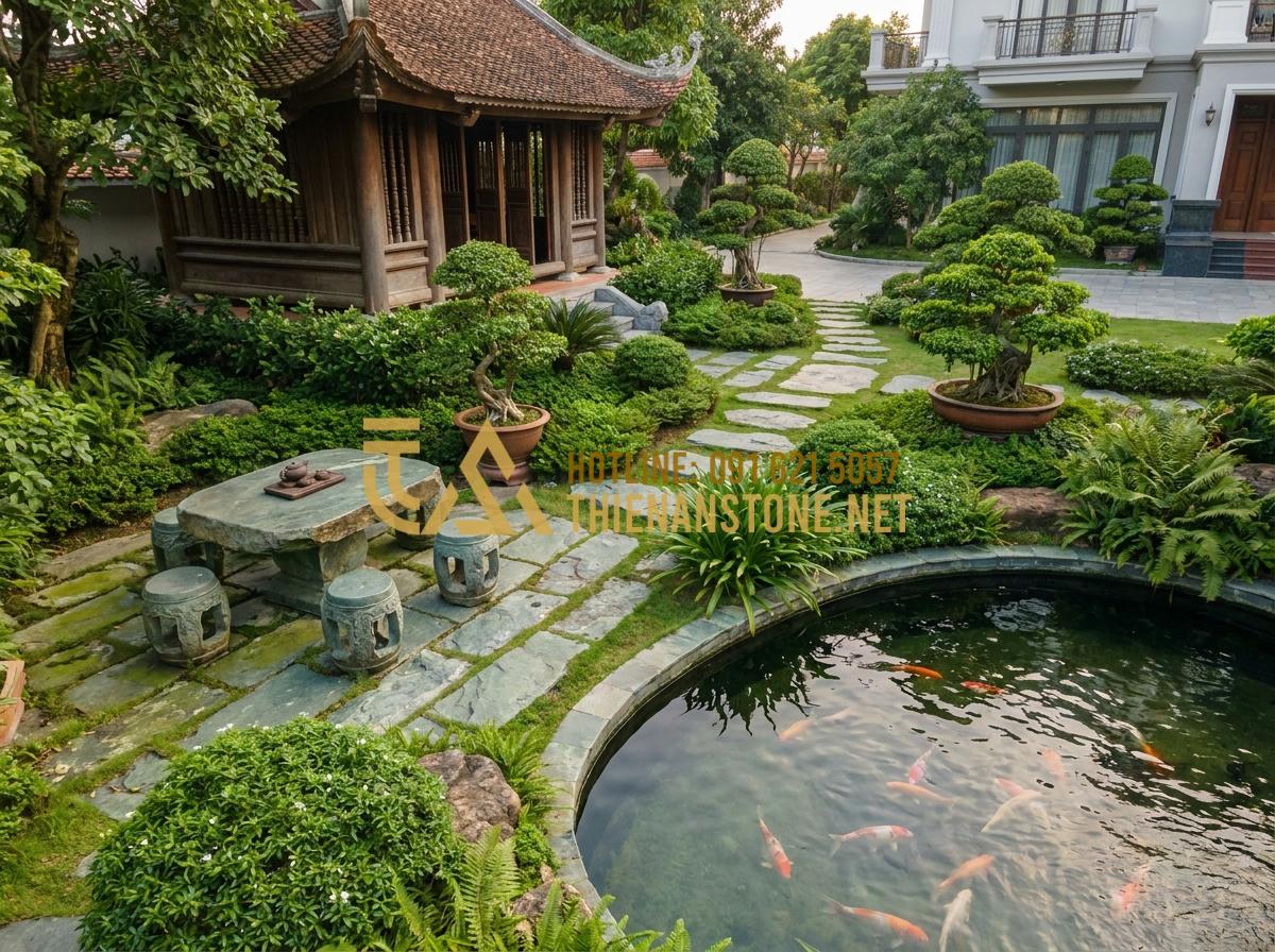 Ý nghĩa phong thủy của bàn trà bằng đá trong kiến trúc nhà ở - Hình 3 Ý nghĩa phong thủy của bàn trà bằng đá trong kiến trúc nhà ở - Tạo ảnh tiếng Anh: An aerial view of a luxury villa garden with a stone tea tabl