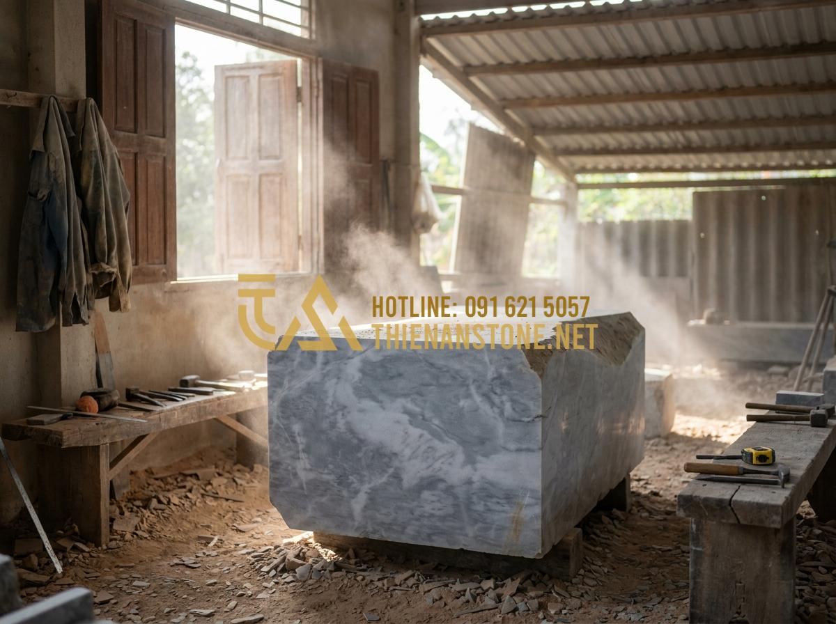 Ý nghĩa phong thủy của bàn trà bằng đá trong kiến trúc nhà ở - Hình 7 Ý nghĩa phong thủy của bàn trà bằng đá trong kiến trúc nhà ở - Tạo ảnh tiếng Anh: Skilled stone artisans working in a traditional workshop in V