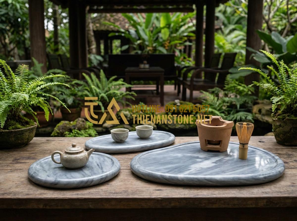 Ý Nghĩa Phong Thủy Của Khay Trà Đá: Cách Chọn Màu Đá Hợp Mệnh Gia Chủ - Handcrafted pebble stone tea tray examples in different sizes with natural river